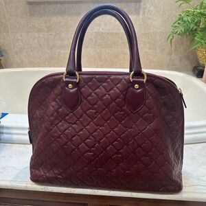 Large maroon embossed leather bag made in Italy by Condotti